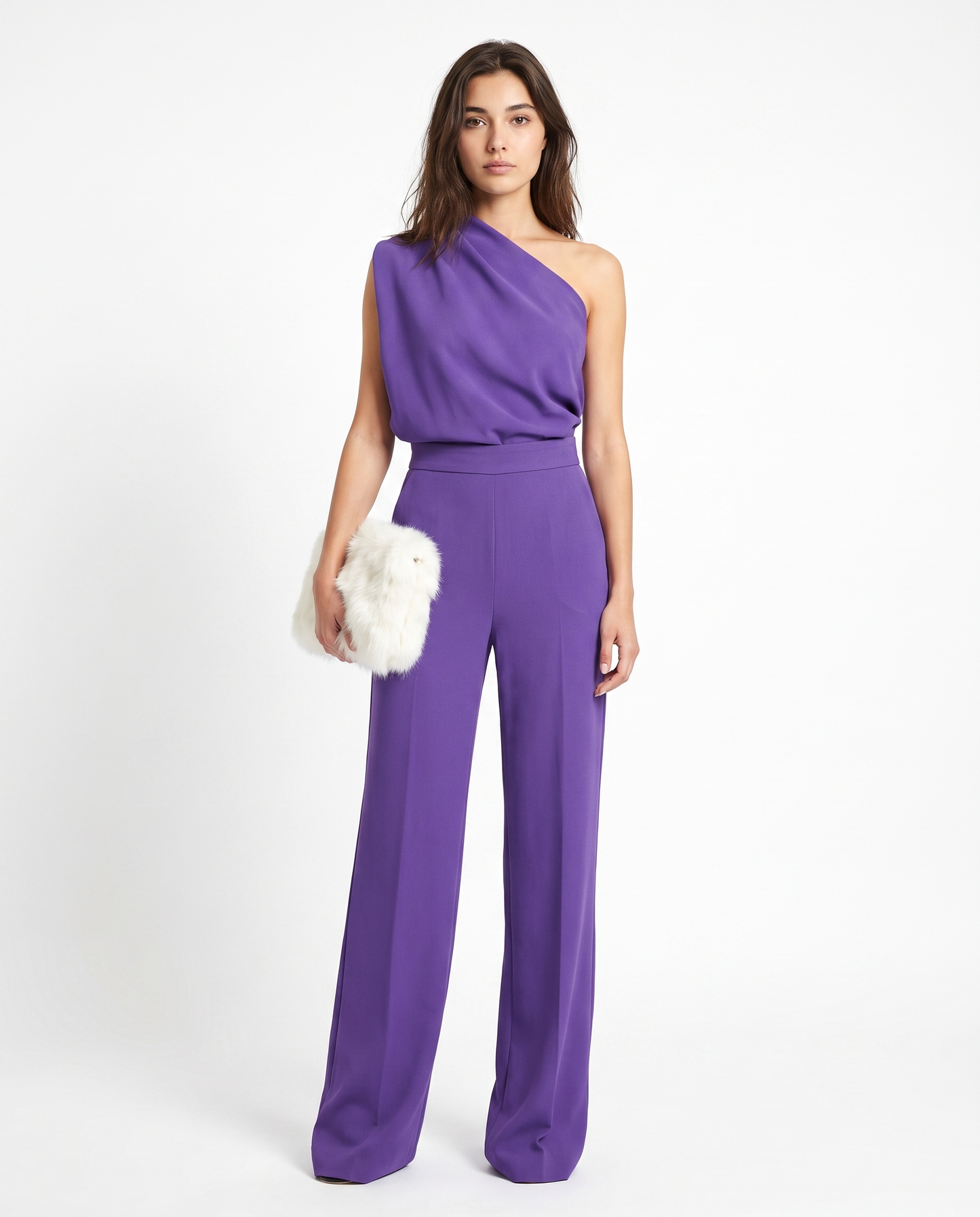 Purple sleeveless belted jumpsuit with one-shoulder drape and wide-leg pants.