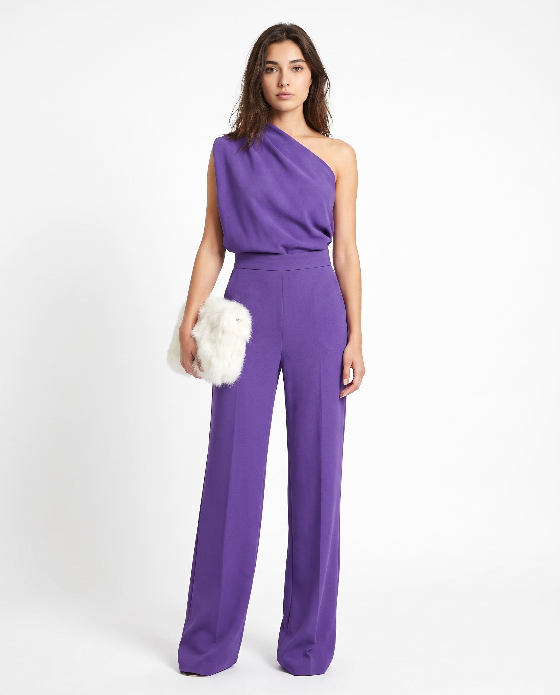 Purple sleeveless belted jumpsuit with one-shoulder drape and wide-leg pants.