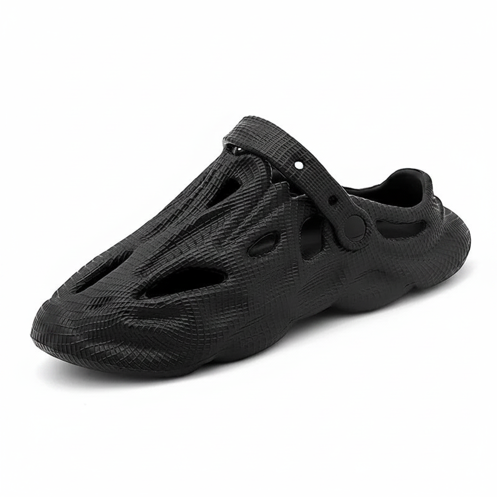 Black slip-on clogs with hollow cutouts and ventilation holes