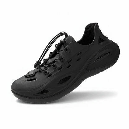 Black lace-up molded clog sandals with perforations, cushioned footbed, and grippy sole