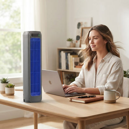 Portable bladeless tower fan in dark grey with blue grille on desk.