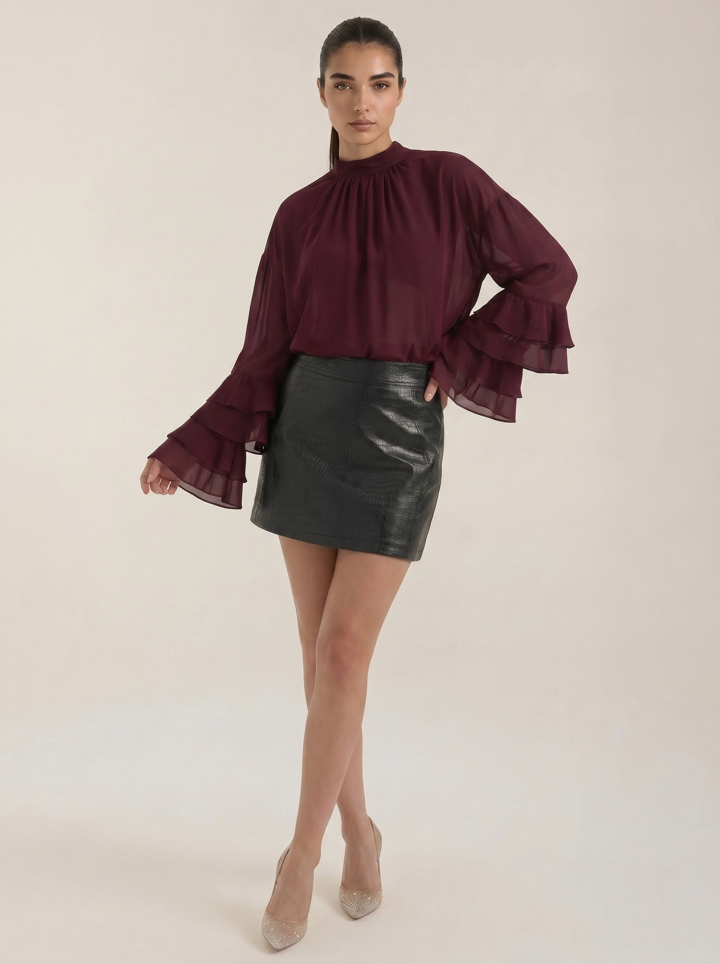 Burgundy high-neck sheer top with ruffled sleeves and gathered front