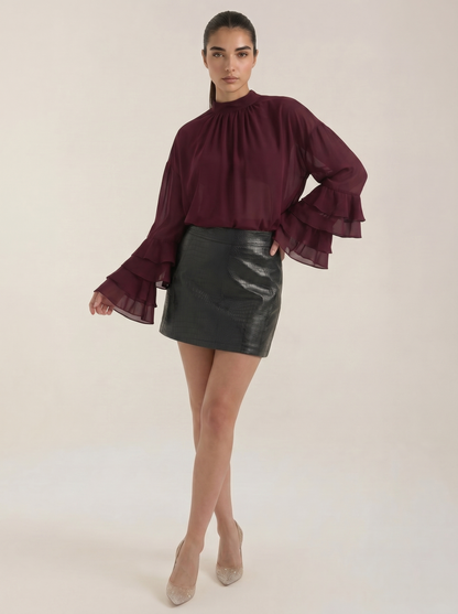 Burgundy high-neck sheer top with ruffled sleeves and gathered front
