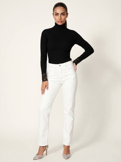 Black women's ribbed turtleneck top with lace cuffs, fitted long sleeves