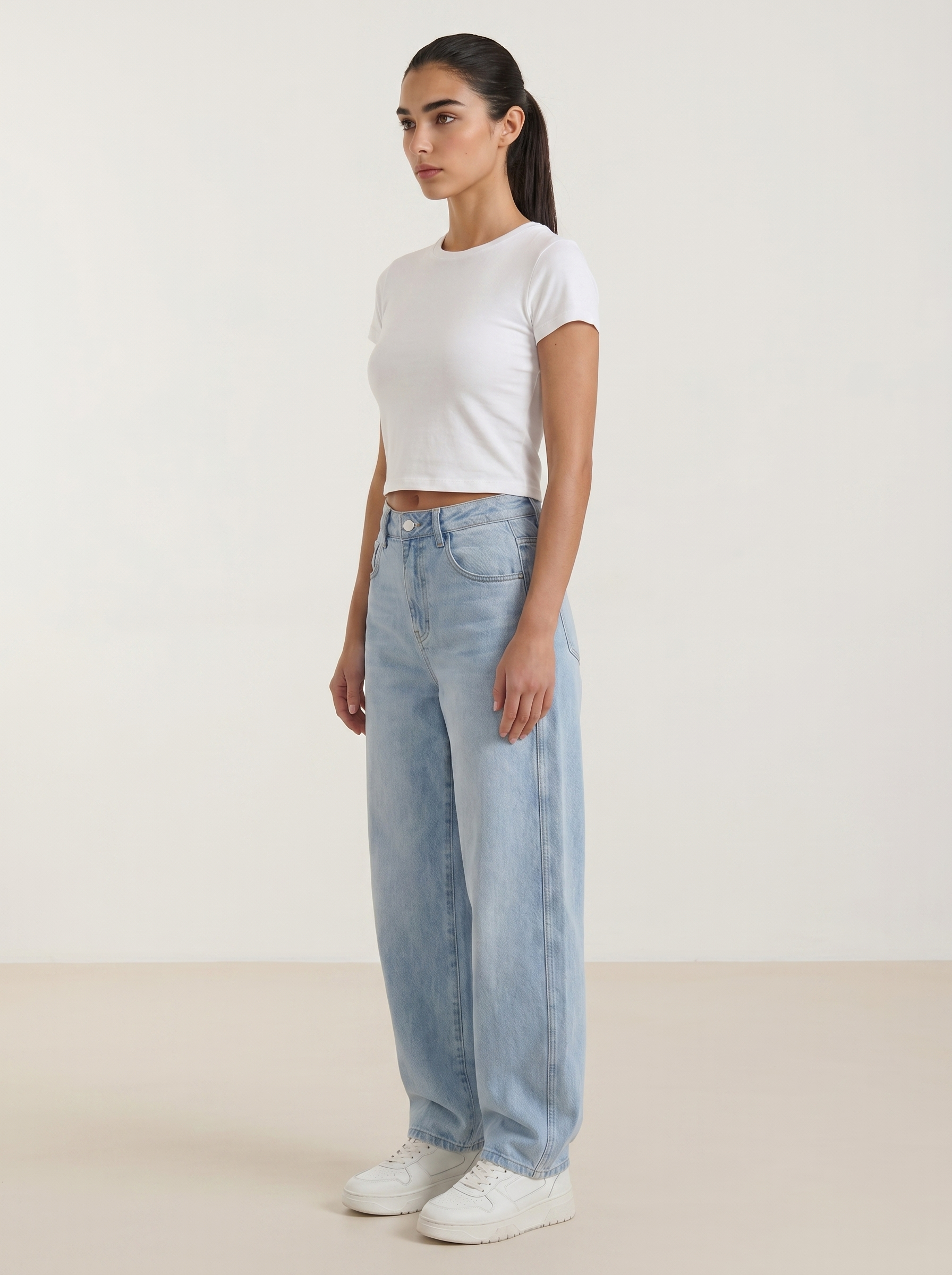 Light blue wide-leg jeans with front pockets and relaxed wide leg fit