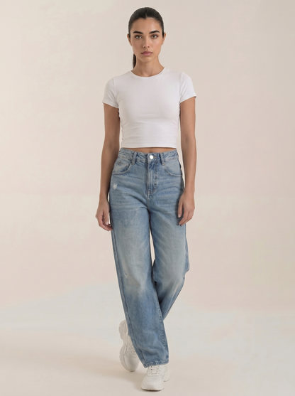 Medium blue wide-leg jeans with front button closure and washed denim finish