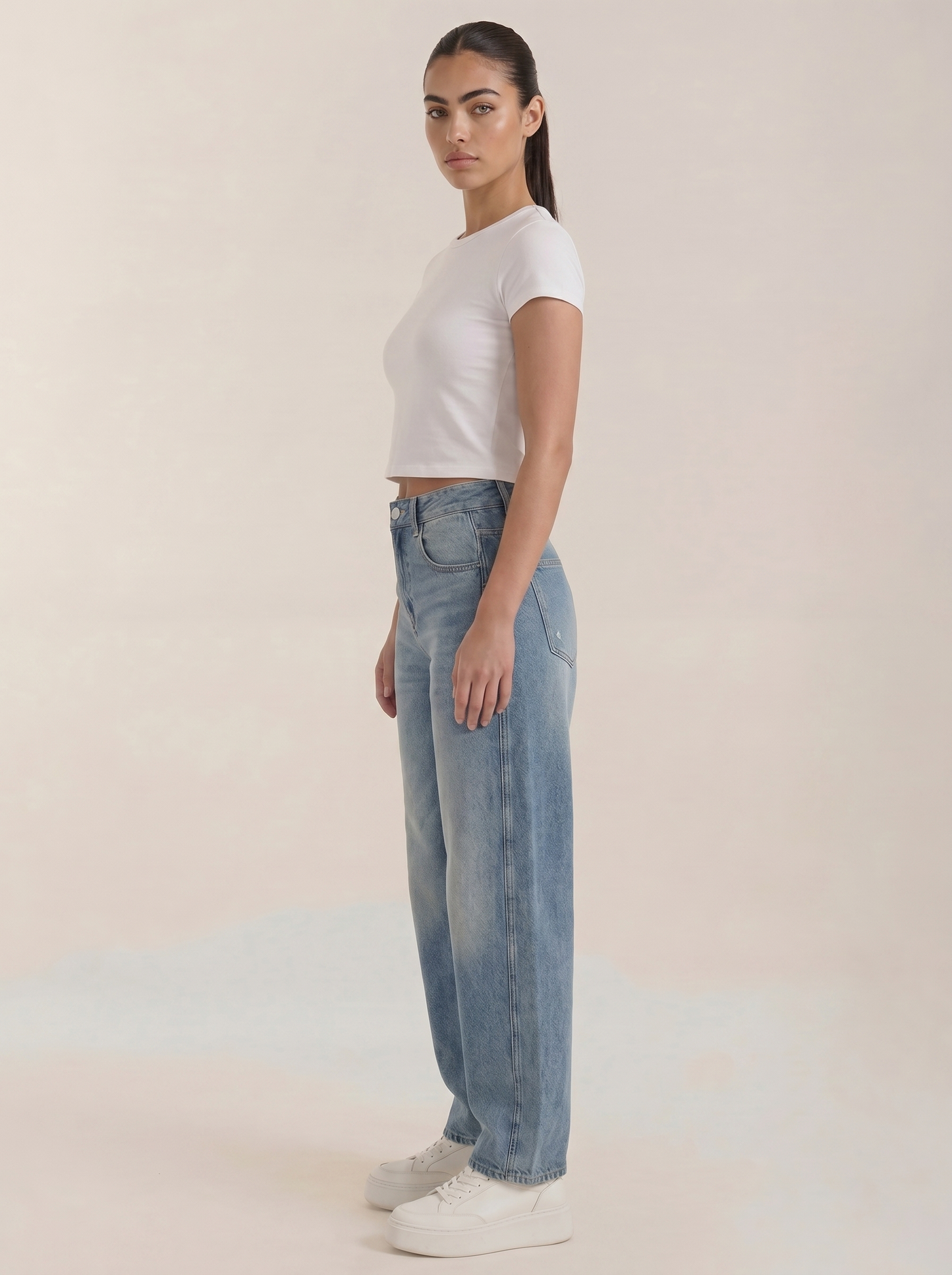 Medium blue wide-leg jeans with side seam detailing and wide leg opening