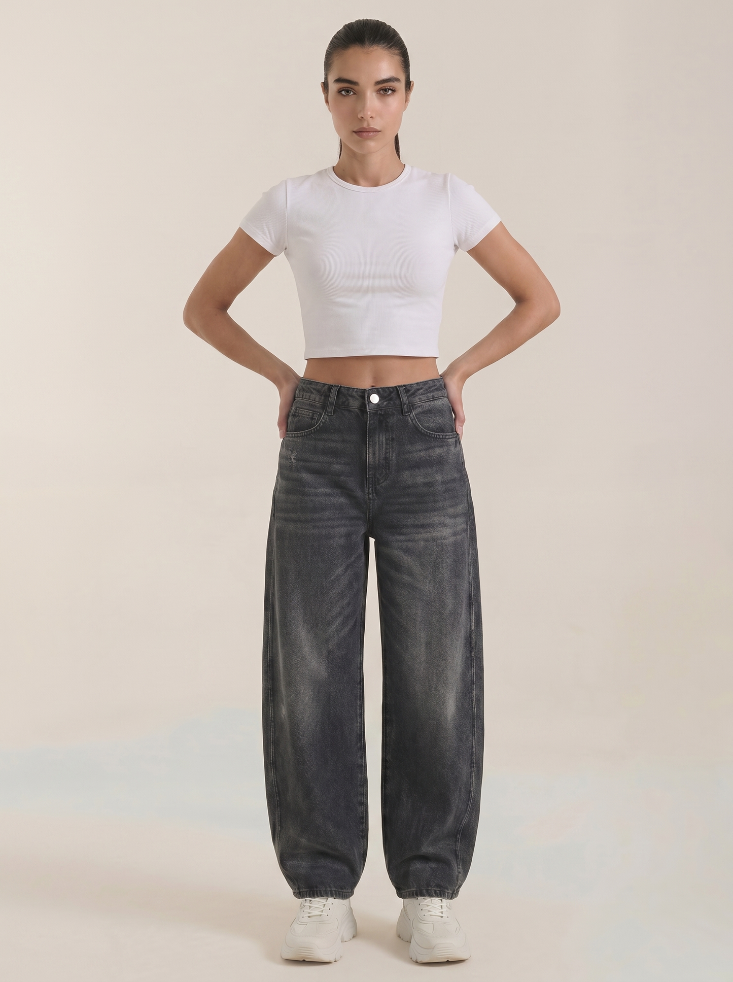 Dark charcoal wide-leg jeans with button closure and relaxed wide legs