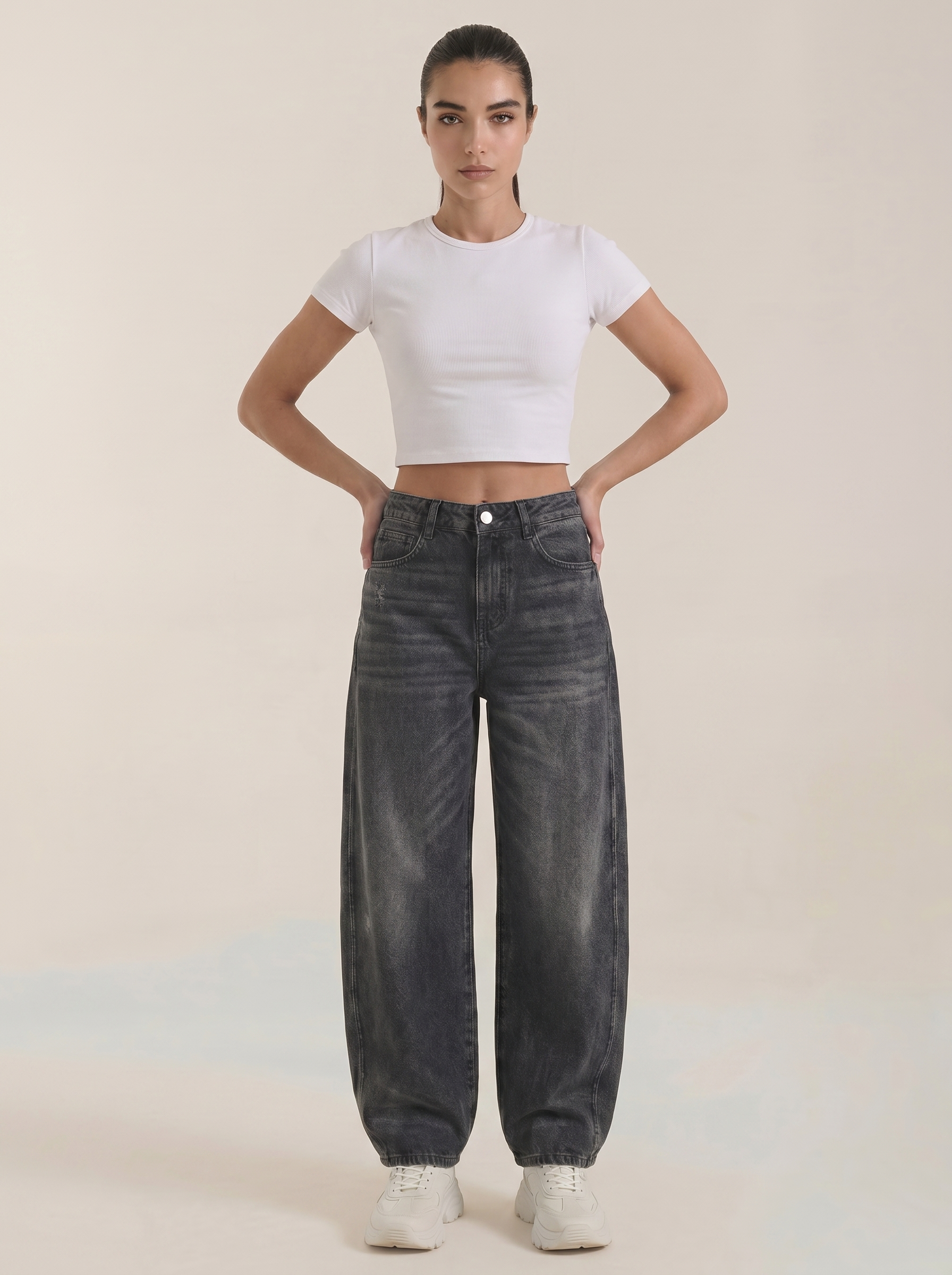 Dark charcoal wide-leg jeans with button closure and relaxed wide legs