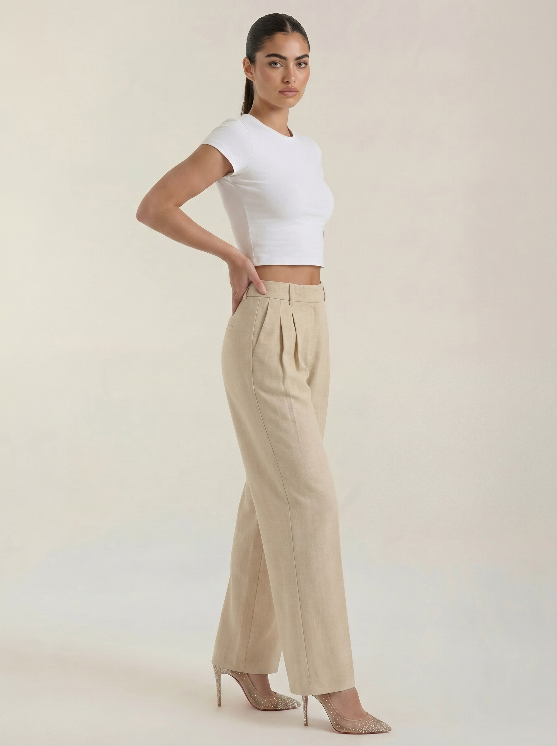 Pleated high-rise wide-leg pants, beige, side view with pleated high-rise waist