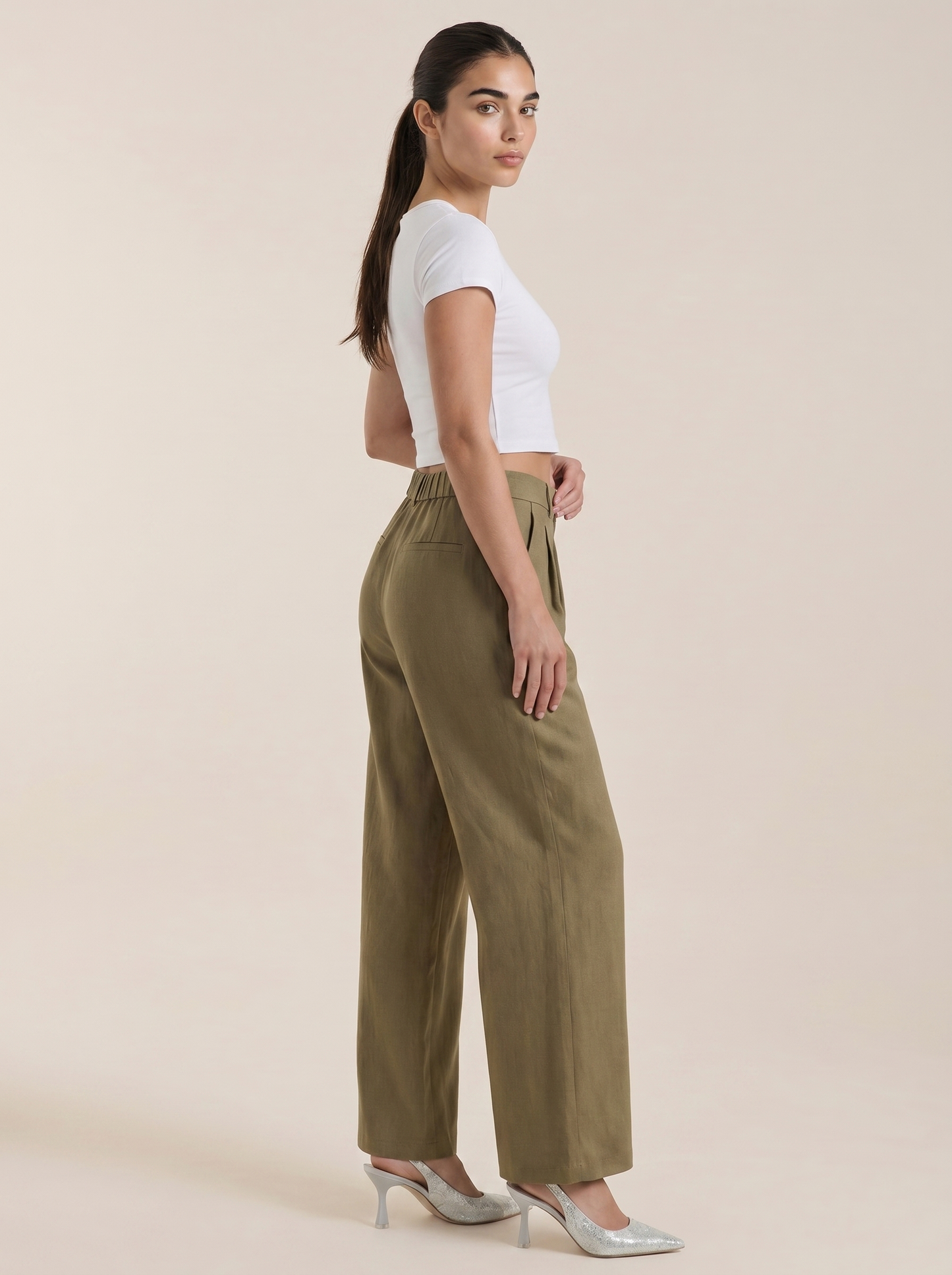 Pleated high-rise wide-leg pants, dark green, side view with wide straight legs