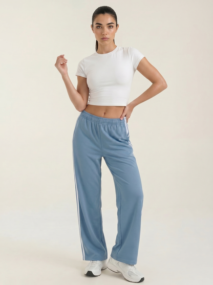 Light blue wide-leg track pants with side stripe, elastic waist and drawstring