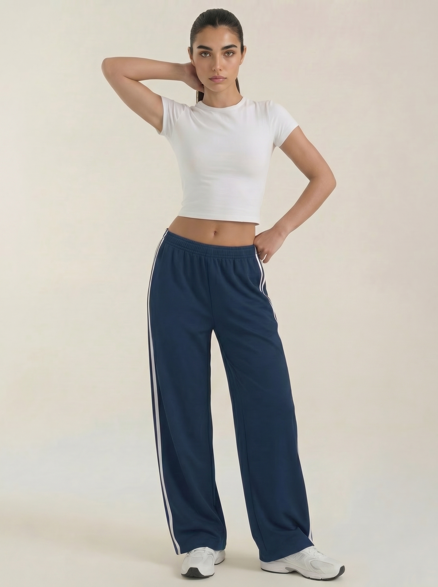 Navy wide-leg track pants with side stripe, elastic waist and drawstring