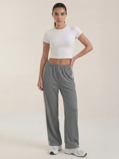 Gray wide-leg track pants with side stripe, elastic waist and drawstring