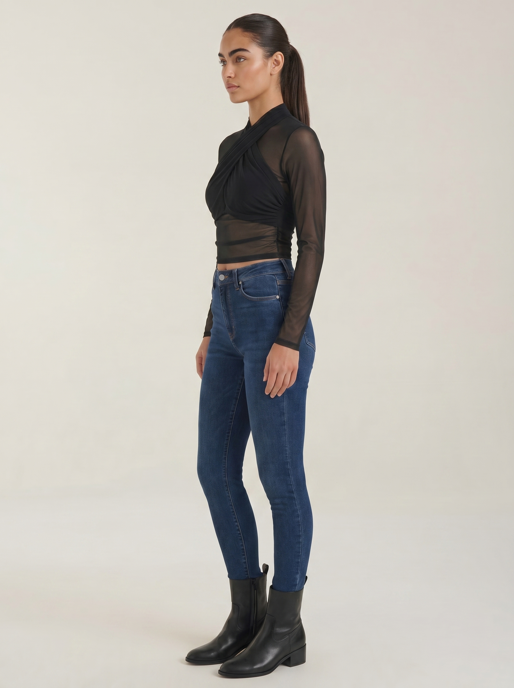 Black sheer wrap mesh top, fitted long sleeves with crossed wrap front