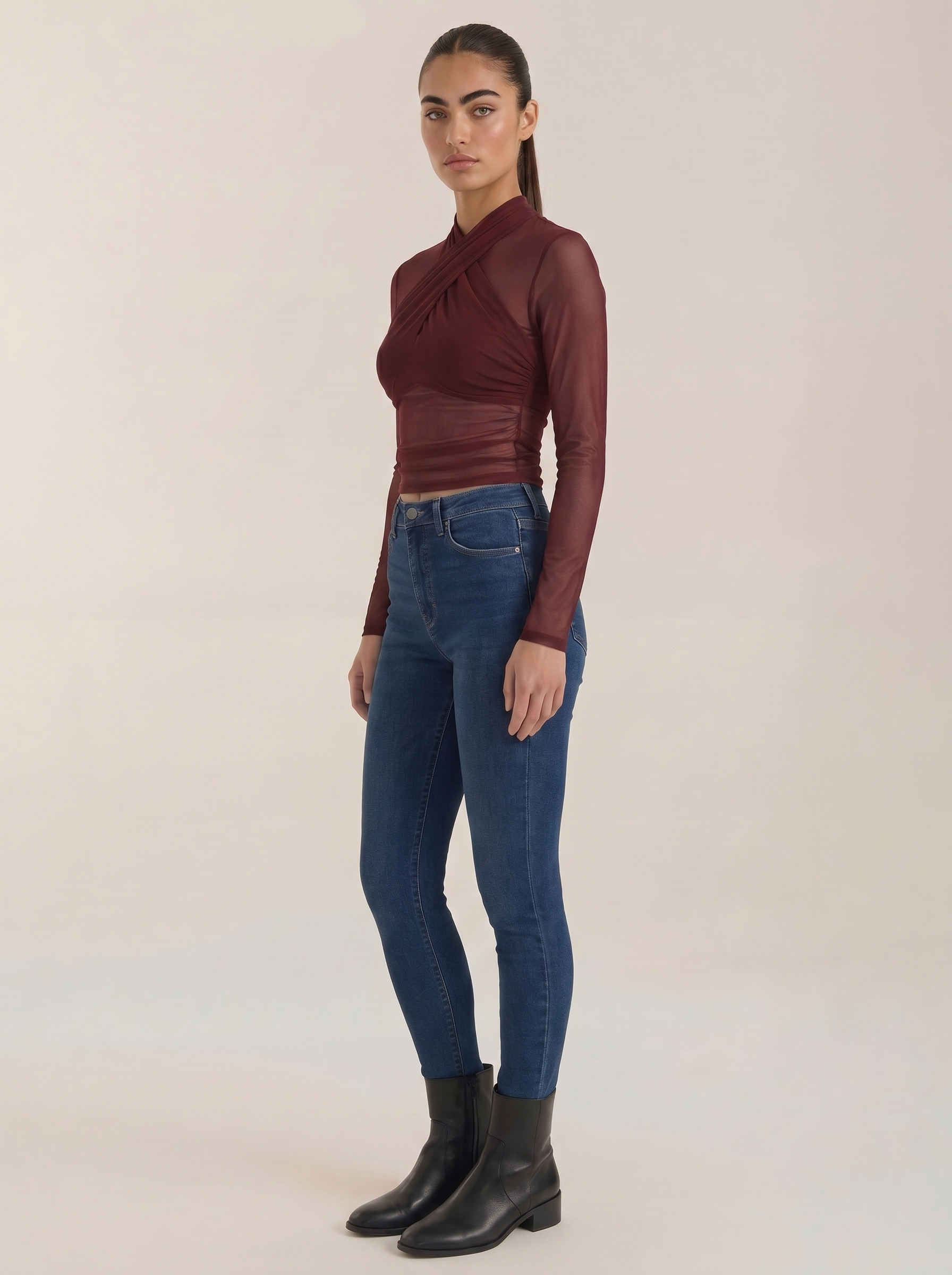 Burgundy sheer wrap mesh top with fitted long sleeves and wrap front