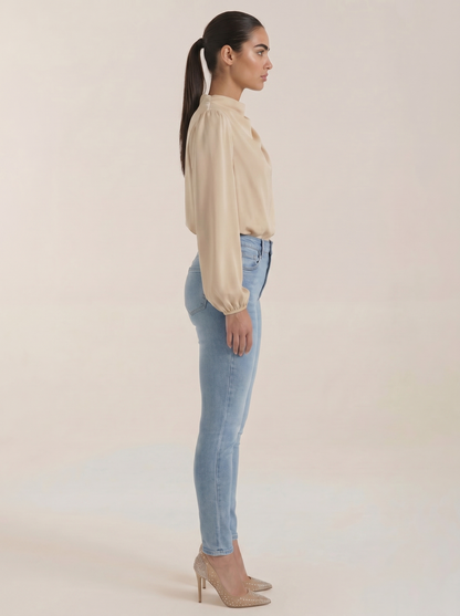 Draped long sleeve blouse in beige satin, side view, long puff sleeves