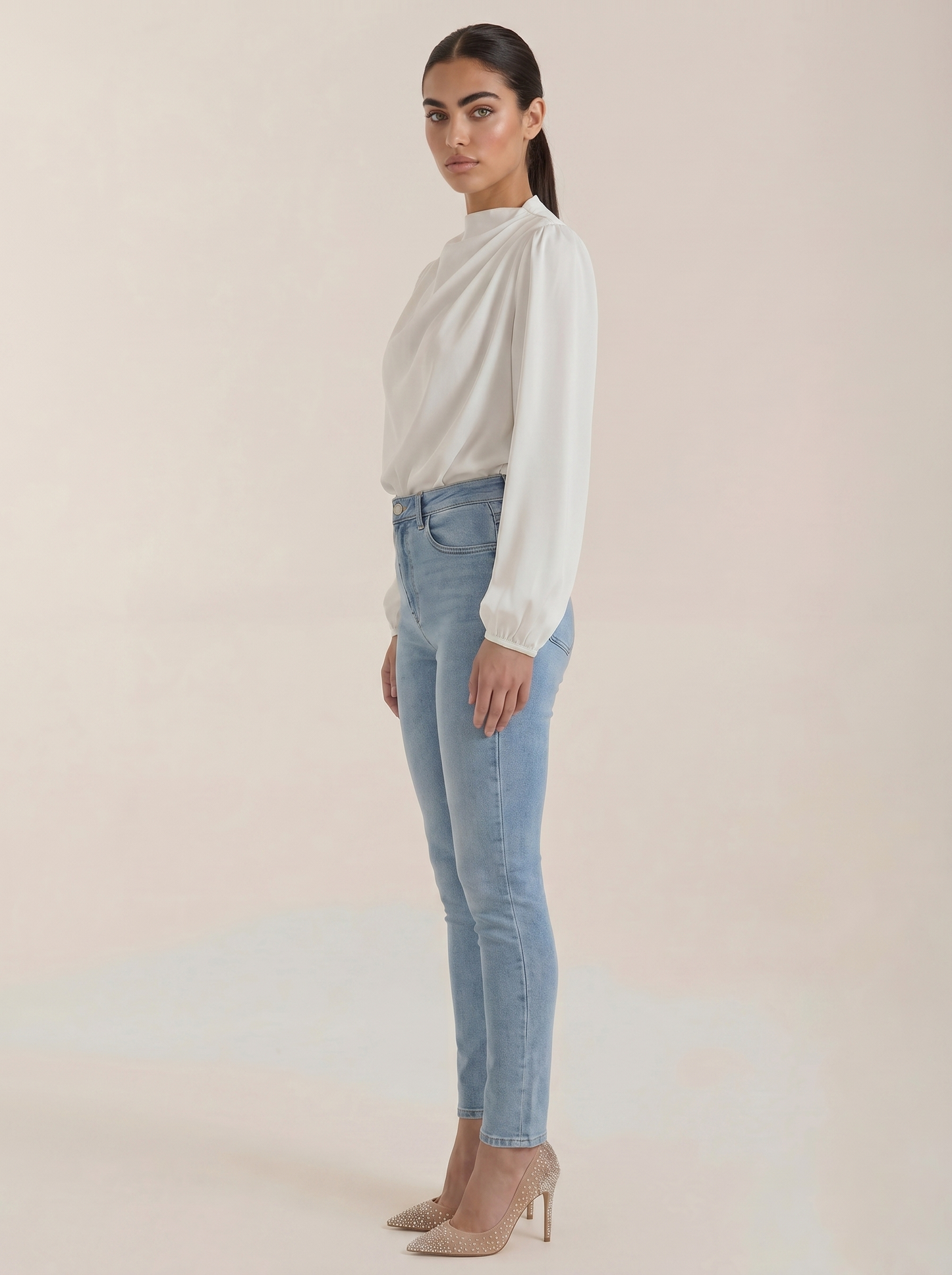 Draped long sleeve blouse in white satin, side view with draped cowl neckline
