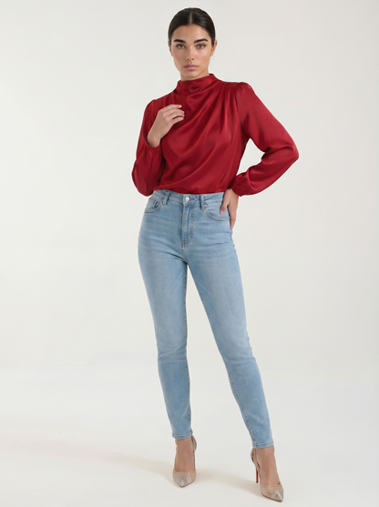 Draped long sleeve blouse in deep red satin with cowl neck and long puff sleeves