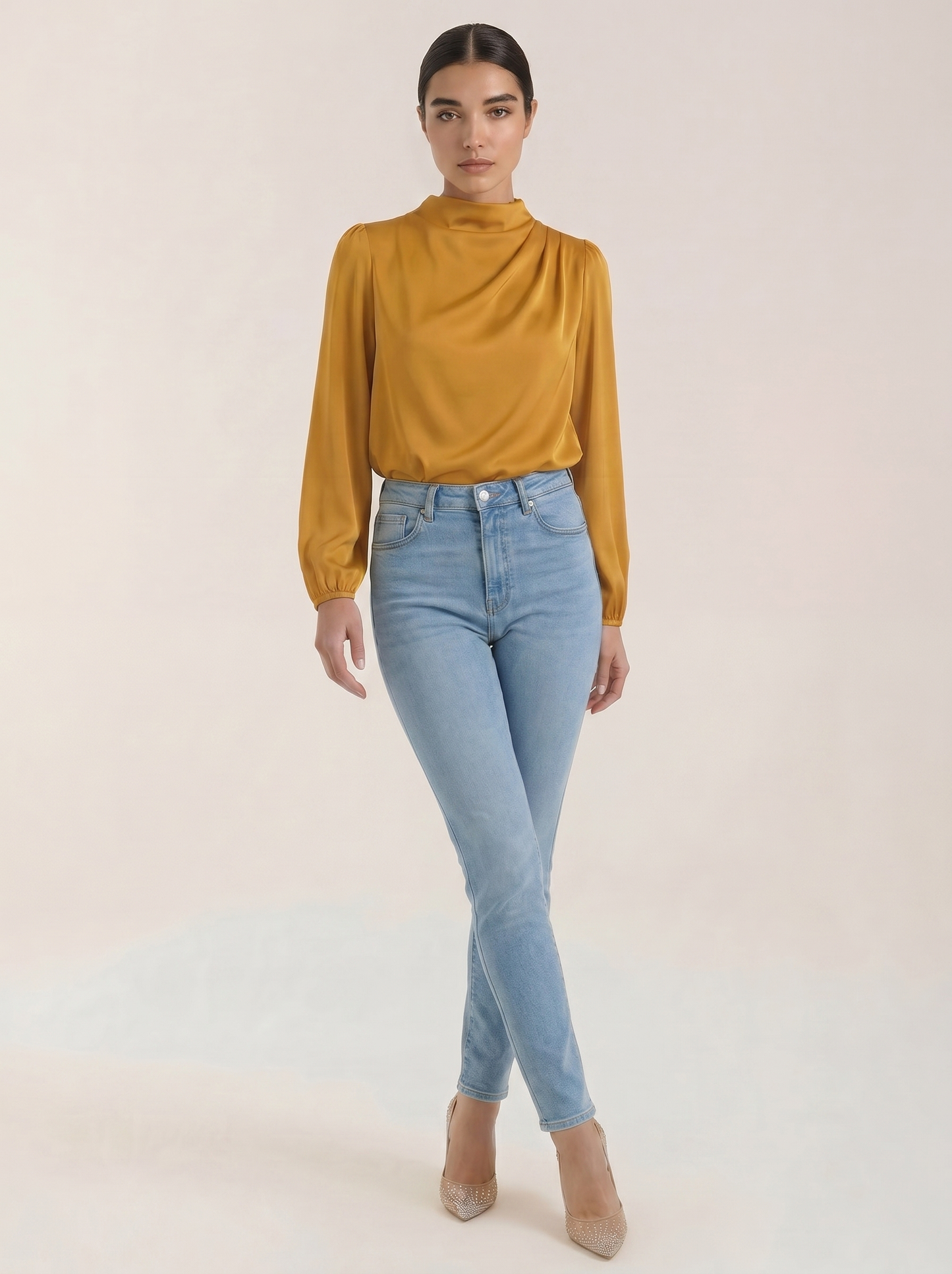 Draped long sleeve blouse in mustard satin with cowl neckline and gathered shoulders