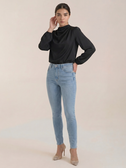 Draped long sleeve blouse in black satin with cowl neck and gathered sleeve cuffs
