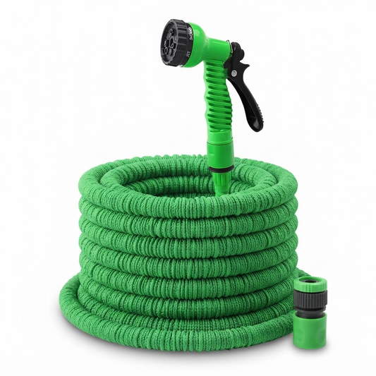 Expandable garden hose with green spray nozzle and neatly coiled green hose
