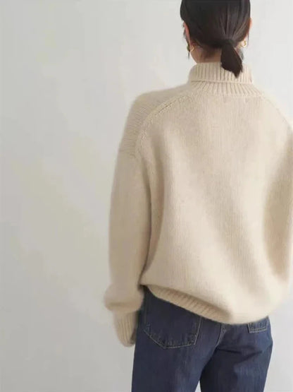 Ribbed turtleneck sweater in cream, back view with high collar